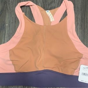 Free People women’s Sport Bra, new with tags! Size small.